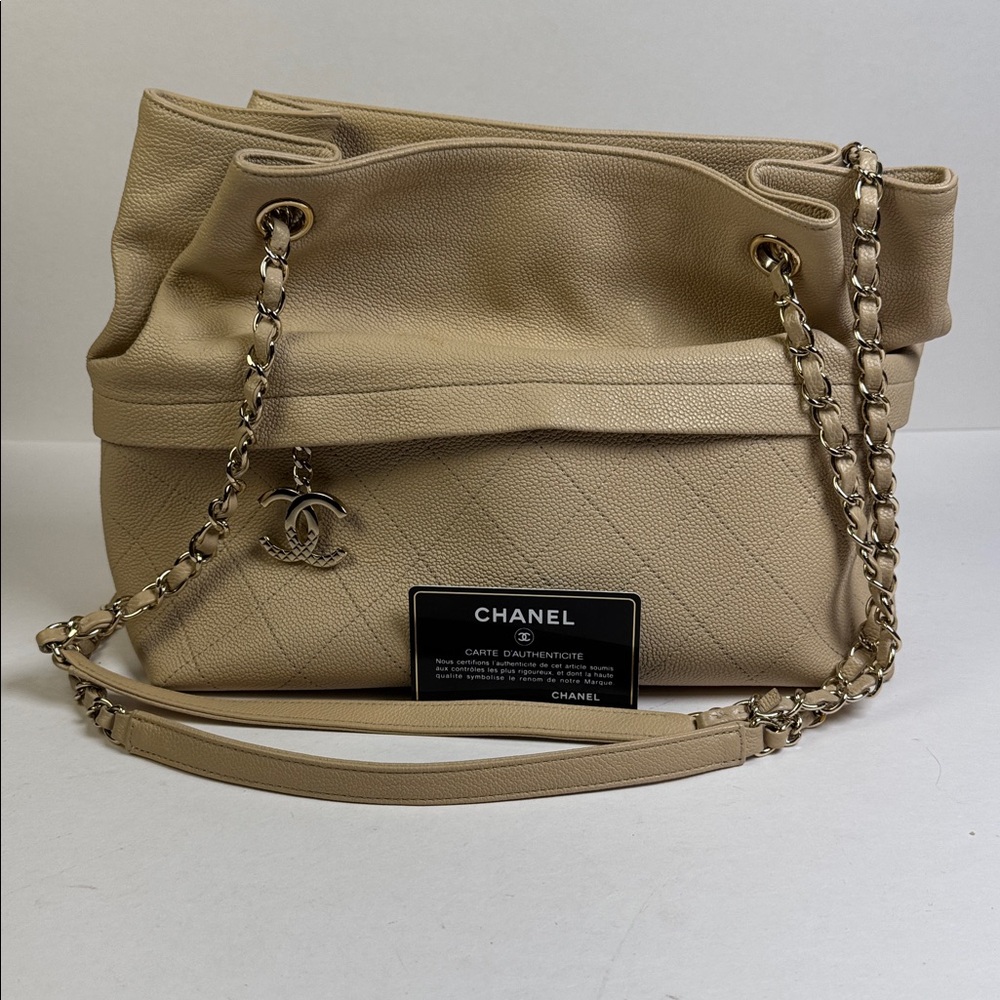 Chanel Large Beige Quilted Calfskin
Zip and Carry Tote with COA